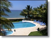 upgraded beachfront villa for sale in Sosua with beach lounge