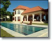 oceanfront luxury villa for sale in Sosua Dominican Republic featuring secluded beach spot