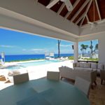 Veranda with fresh views of the pool and ocean background