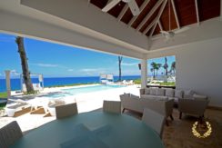 Veranda with fresh views of the pool and ocean background